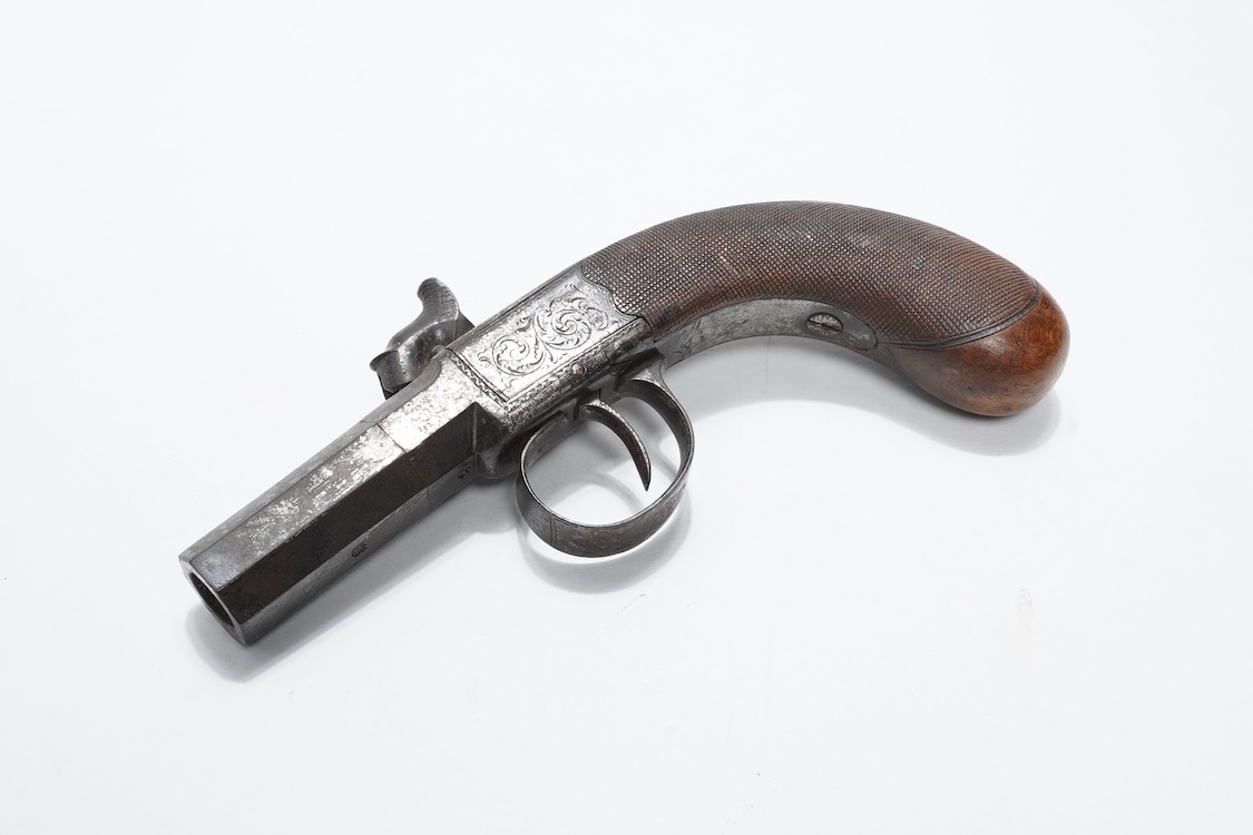 A boxlock side hammer percussion pocket pistol retailed by Weston of Brighton, foliate engraved frame and side hammer, Birmingham proved, rounded chequered walnut grip, barrel 3.5cm